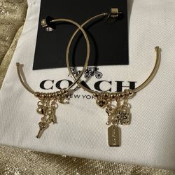 Coach gold charm hoop earrings 