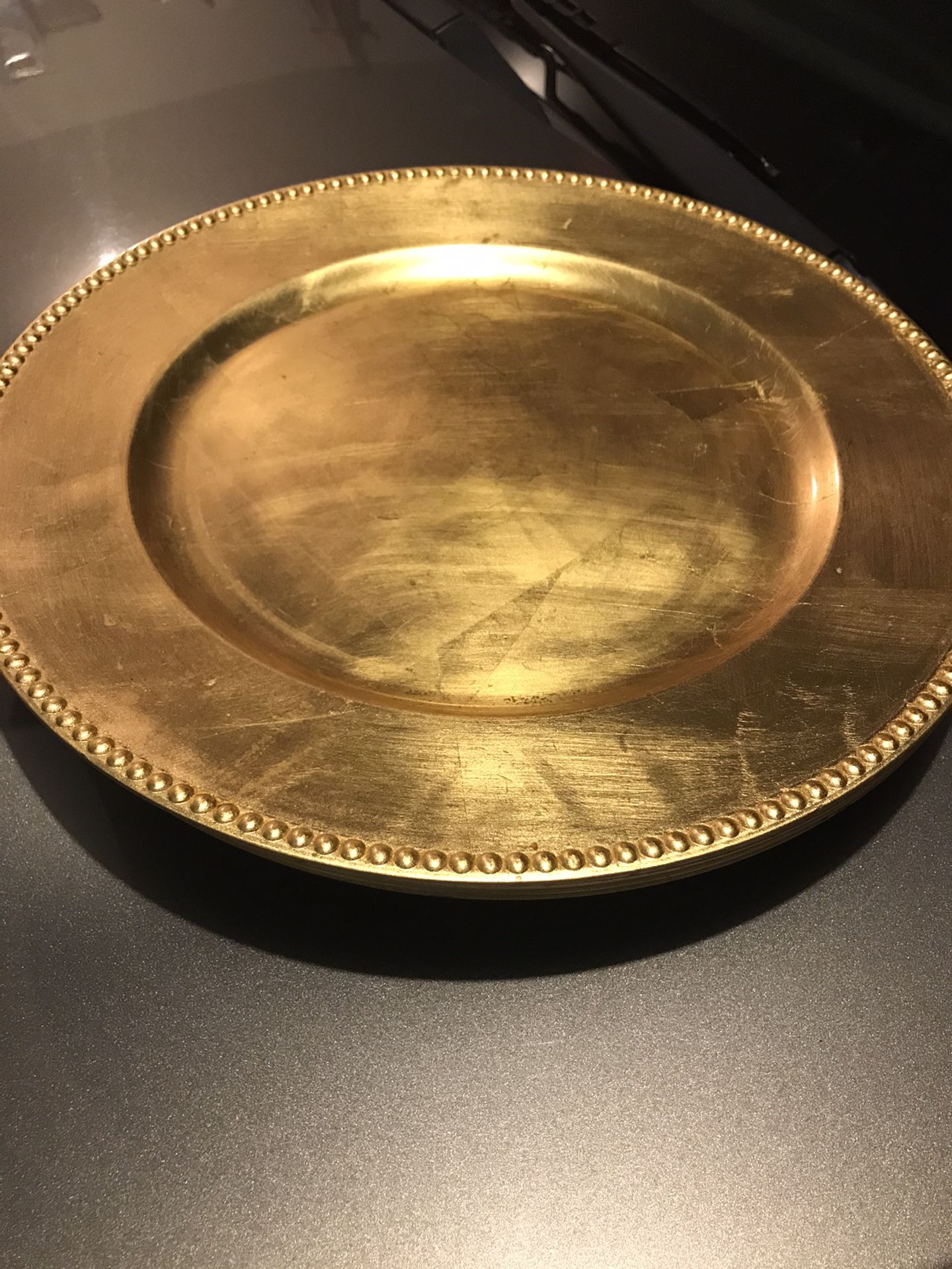 Set of 4 gold plate chargers