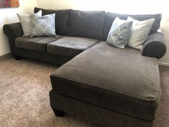 Macy’s dark gray sectional w deep seats and washable covers