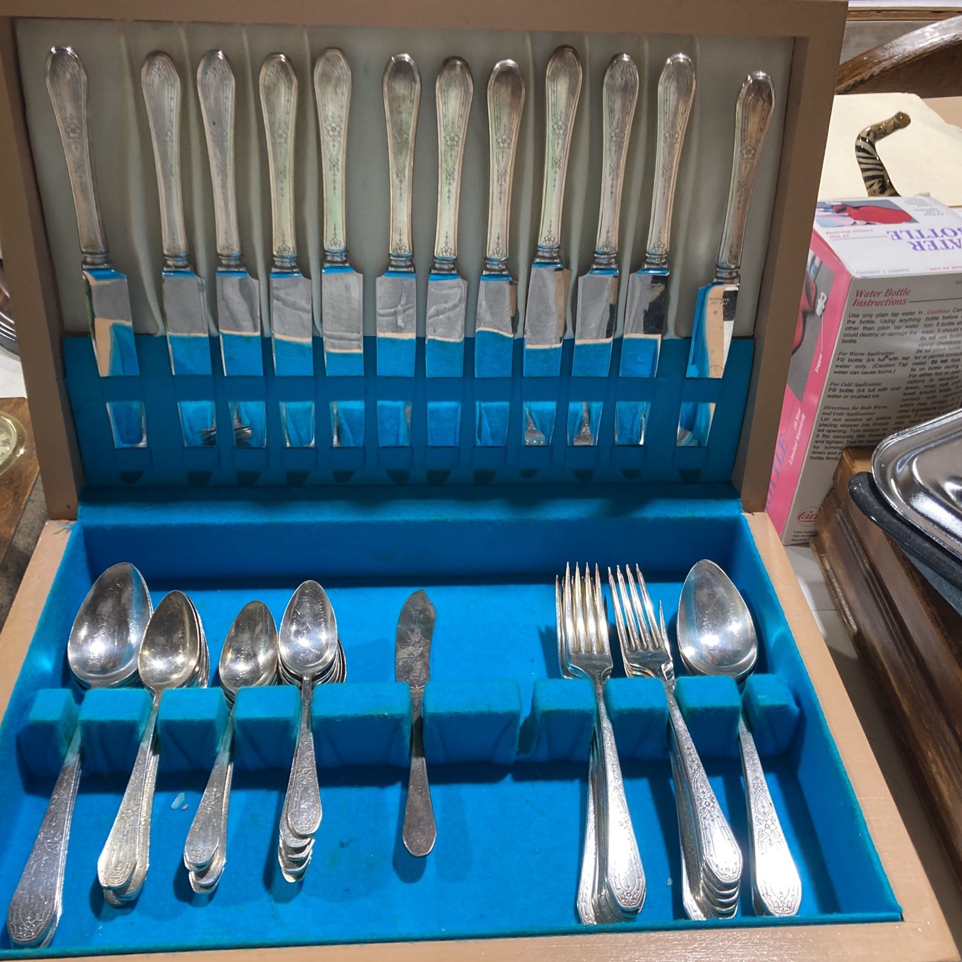 Vintage Silverware With Box. 12 Knives. 6 Big Spoons. 12 Big Forks. One Butter Knife. 18 Spoons.