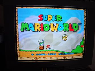 Super Nintendo with game