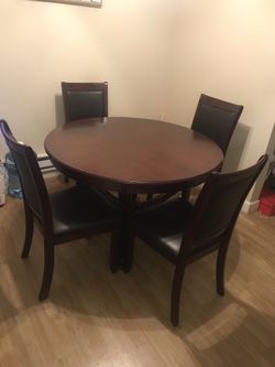 Brand new table and 4 chairs!!!