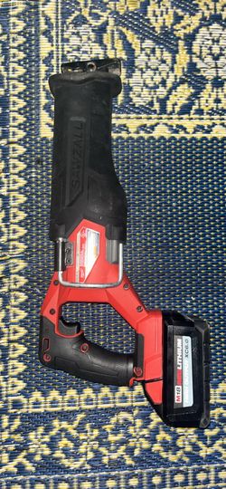 Milwaukee M18 FUEL SAWZALL with a genuine M18 REDLITHIUM HIGH OUTPUT XC6.0 battery
