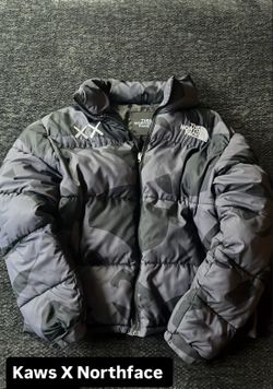 northface x kaws puffer