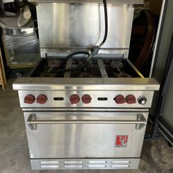 Six burner Wolf stove with oven