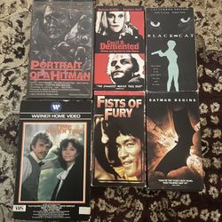 VHS tapes videocassette Batman Begins, Black Cat, Fist of Furry etc…