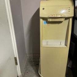 Water Dispenser In Working Condition With Extra Refill Bottles