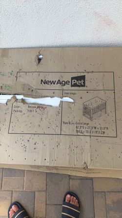 Brand new dog cage/furniture piece slightly damaged