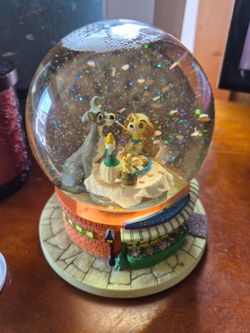 Vintage Lady and the Tramp snow globe