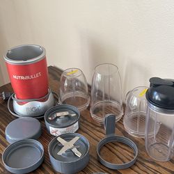 Red NutriBullet Personal Blender and Accessories 