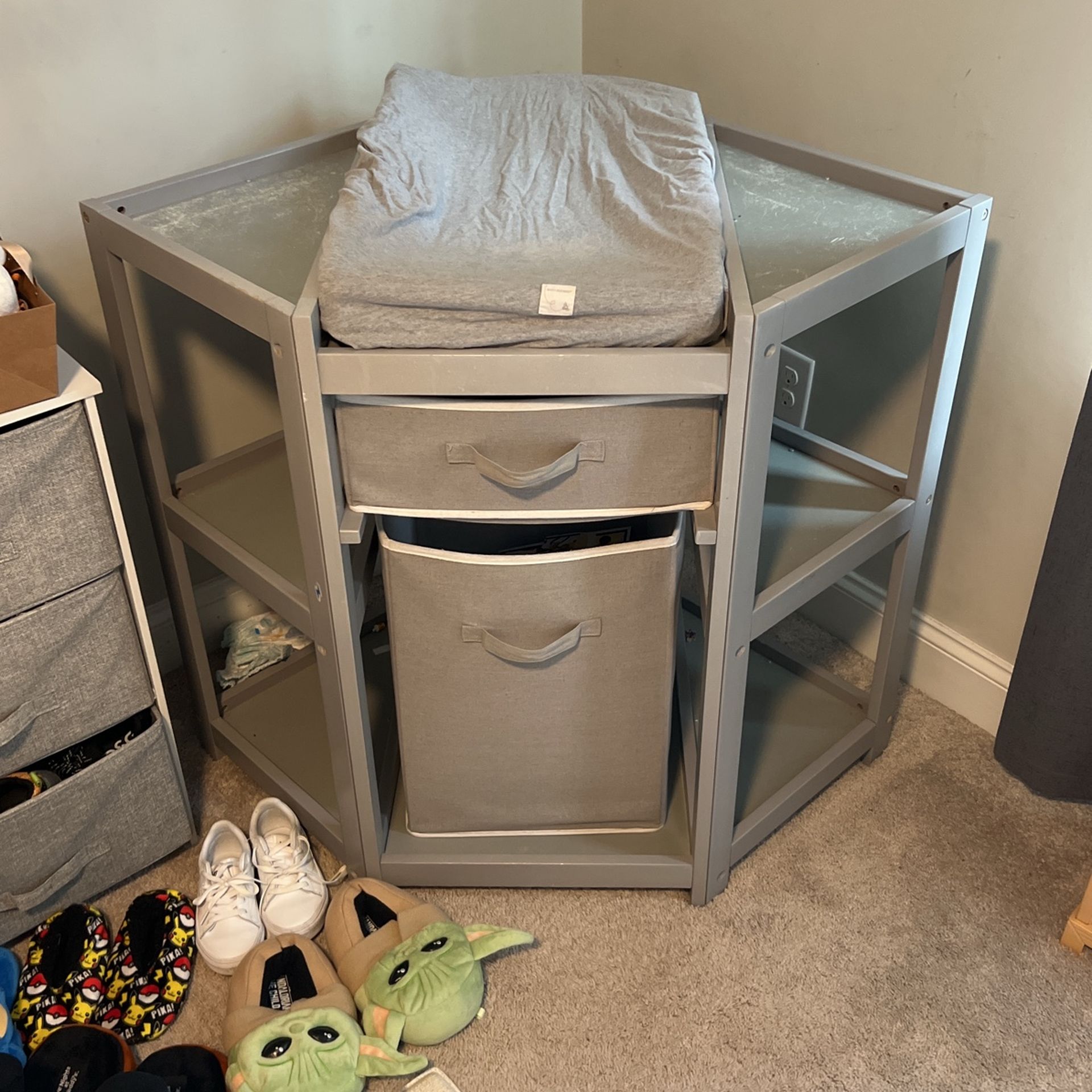 Badger Basket Corner Diaper Changing Table with Laundry Hamper, Storage Bin, and Contoured Pad for Baby - Gray