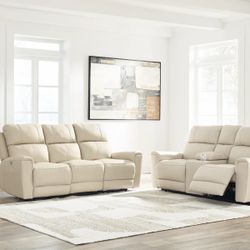 100% leather power recliner sofa and loveseat by Ashley