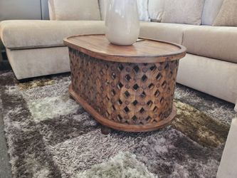 Carved Wood Oval Coffee Table