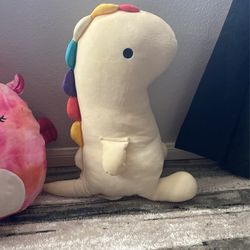 rainbow dino plushie