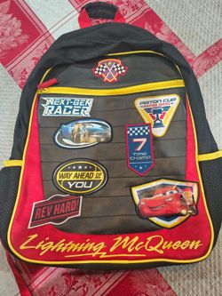 Disney Pixar Cars backpack features stitched patches of Lightning McQueen