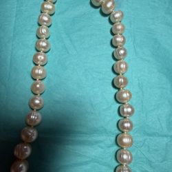 Necklace Pearl Type: Freshwater Cultured Pearls.