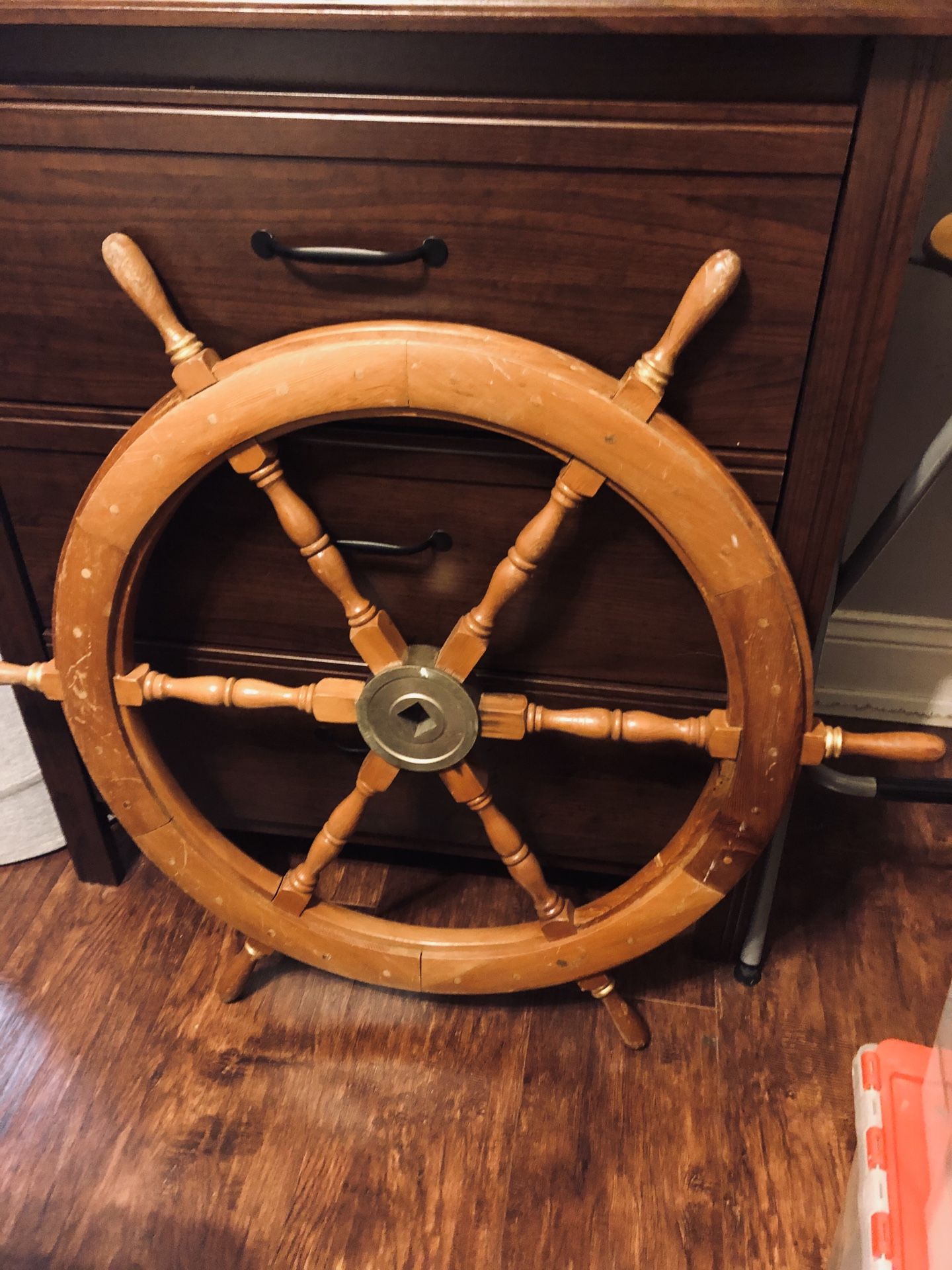 Wooden boat wheel..