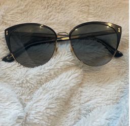 Gucci black and gold cat-eye sunglasses