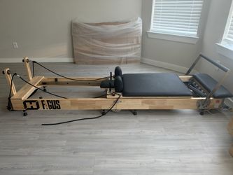 Pilates machine with box for exercise