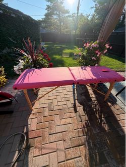 Pink massage table
