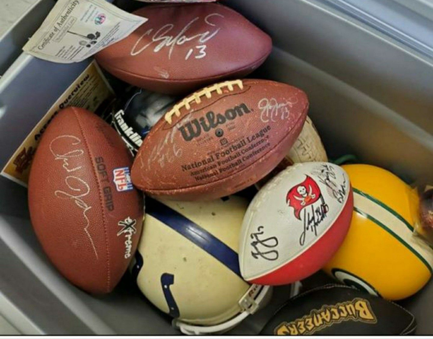 SIGNED SPORTS COLLECTABLES. HELMETS, FOOTBALLS, BASEBALLS, JERSEYS. TONS OF BASEBALL CARDS AND OTHER SPORTS CARDS