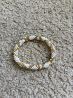 I accept offers white/gold lily and laura bracelet