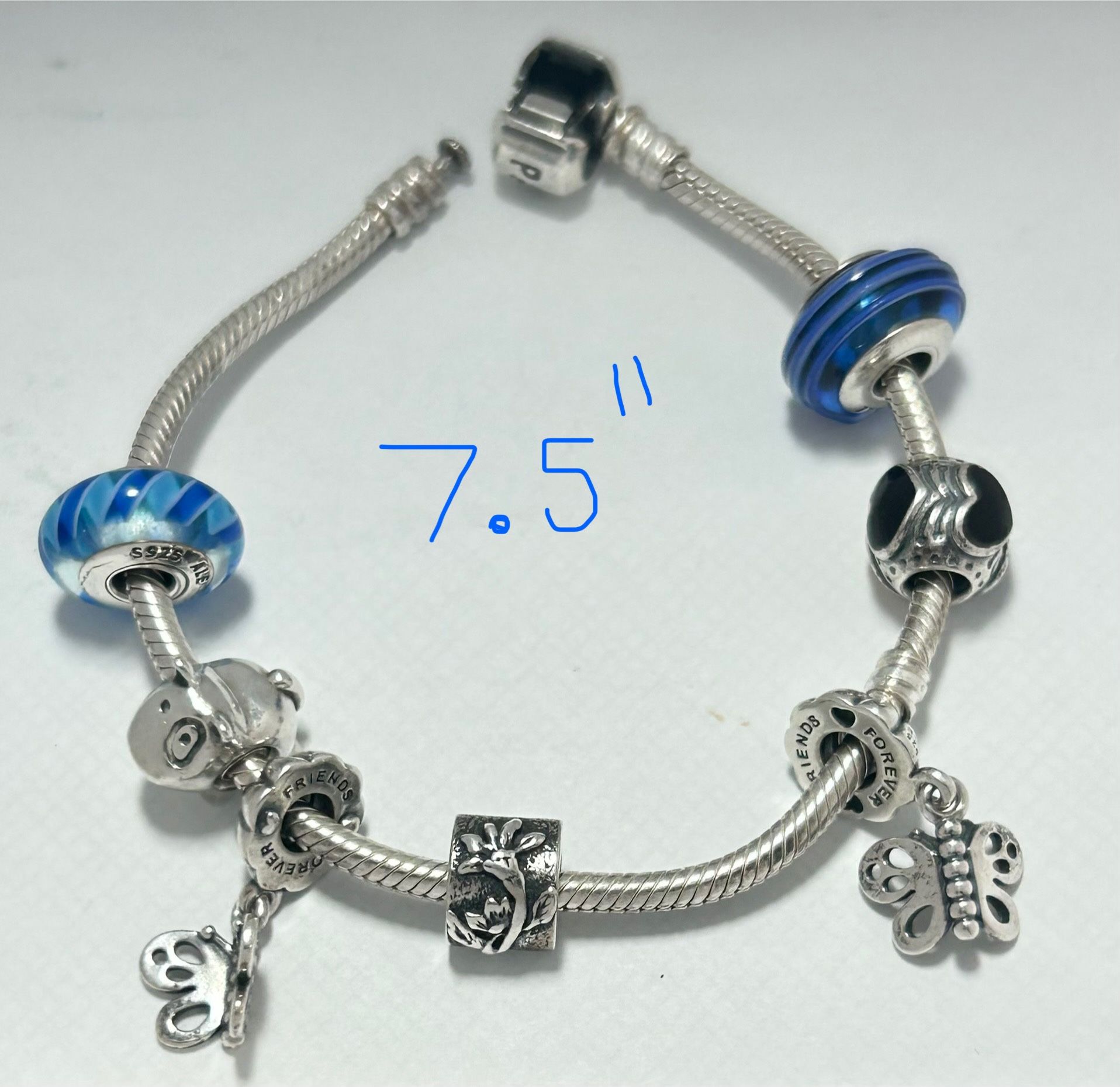 Pandora 7.5” Bracelet with 7 charms