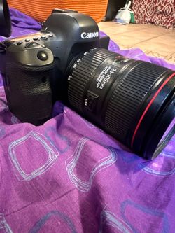 Canon camera w/ 3 lenses
