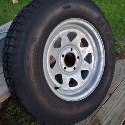 H188 ST205/75D15 boat trailer tire on rim.