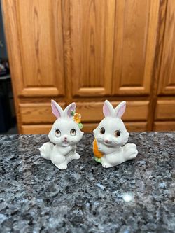 Ceramic Bunny Pair of Salt and Pepper Shakers. Preowned some minor wear on the carrots due to age. The stoppers are new. Size appropriately 3 inch