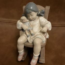Lladro Figurine “Little Girl In Rocking Chair With Doll”