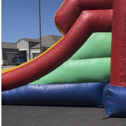 Bounce house with slide