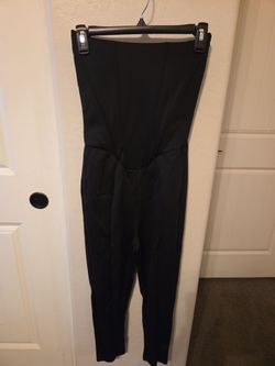 Black sleeveless jumpsuit