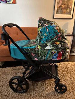 Cybex DJ Khaled We The Best Tropical Parrot Bassinet