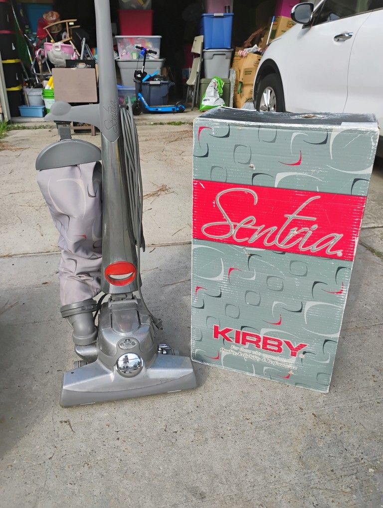 Vacuum cleaner with all accessories . (Kirby)..