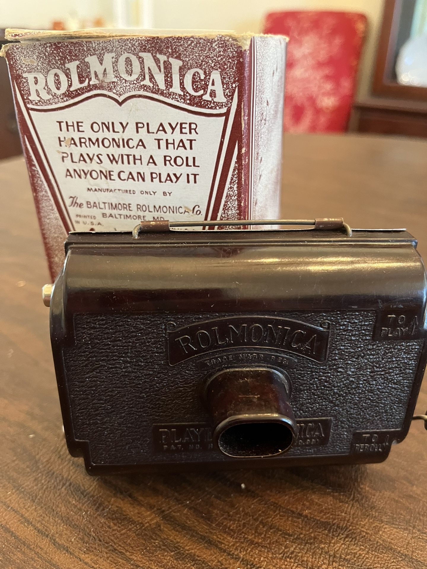 1920’s Antique Rolmonica Harmonica Player