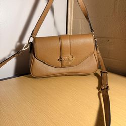 New, authentic Guess bags (store originals) and some perfumes for sale.