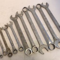 Assortment of wrenches sizes ((4-7/8, 1-13/16, 1-3/4,) and others.
