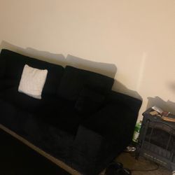 All black Sectional Couch With Pillows 