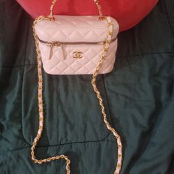 👜