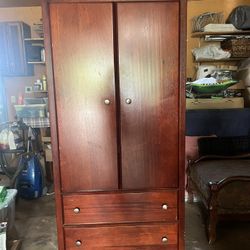 Wooden Armoire With Shelves And Drawers