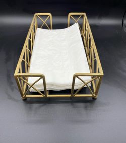 Upscale your dinner table  or bathroom with this New Gold napkin holder features a modern, open-wire crisscross geometric design.