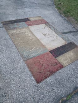 6*8 area rug multi colored earth tones
