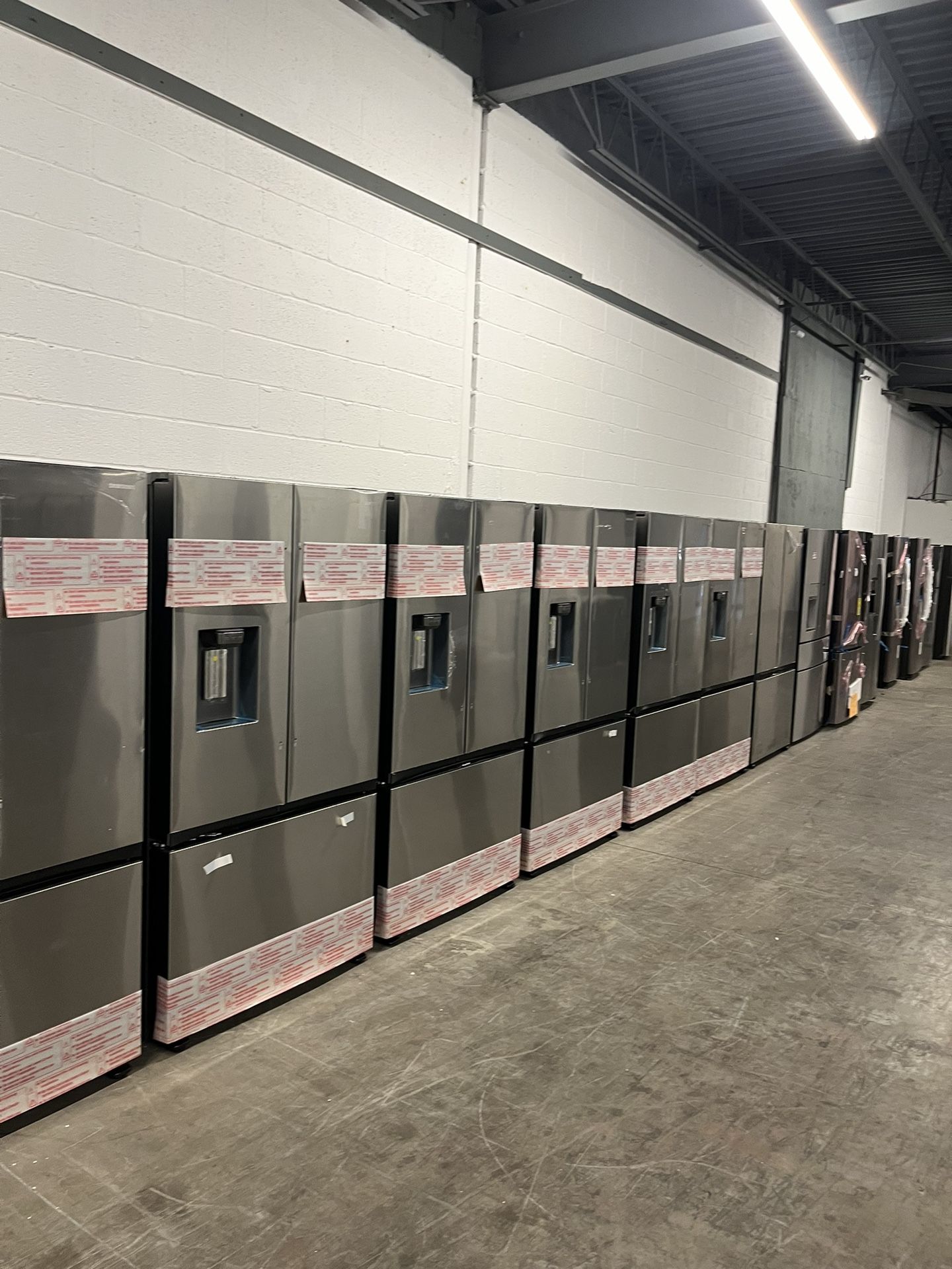 brand new Samsung 32CU mega capacity French door refrigerator icemaker on outside and inside
