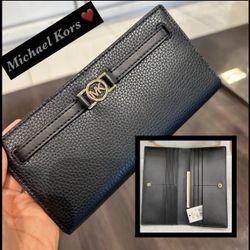 Michael Kors  Black wallet $60  firm  tag price ( retail $298)