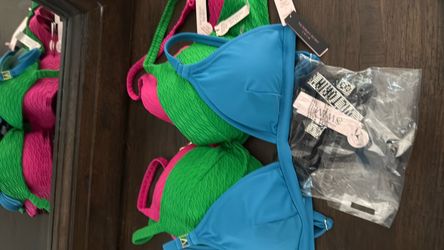 Brand new lot of 4 Victoria Secret Swimwear size large and 36 D