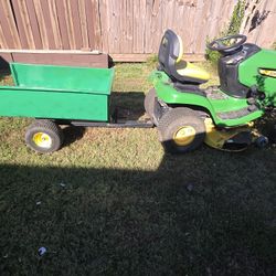Jonh Deere X300 With Small Trailer 