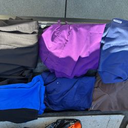 5 Sets of Scrubs  , And a pair of Black Scrub Pants .Size Large Very Good Condition. 