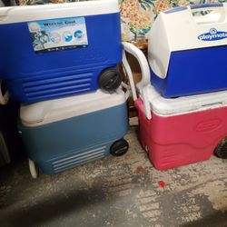 3 Large Rolling Coolers, and ONE Job site coller for sale.