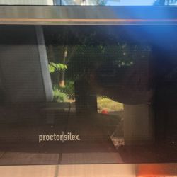 Used Microwave 1000 Watts Proctor/Silex  Retail  $75.99  at Wal-Mart  60.00 Obo. Delivered In Gainesville , High Springs, or Ft. White For $7.00 More 